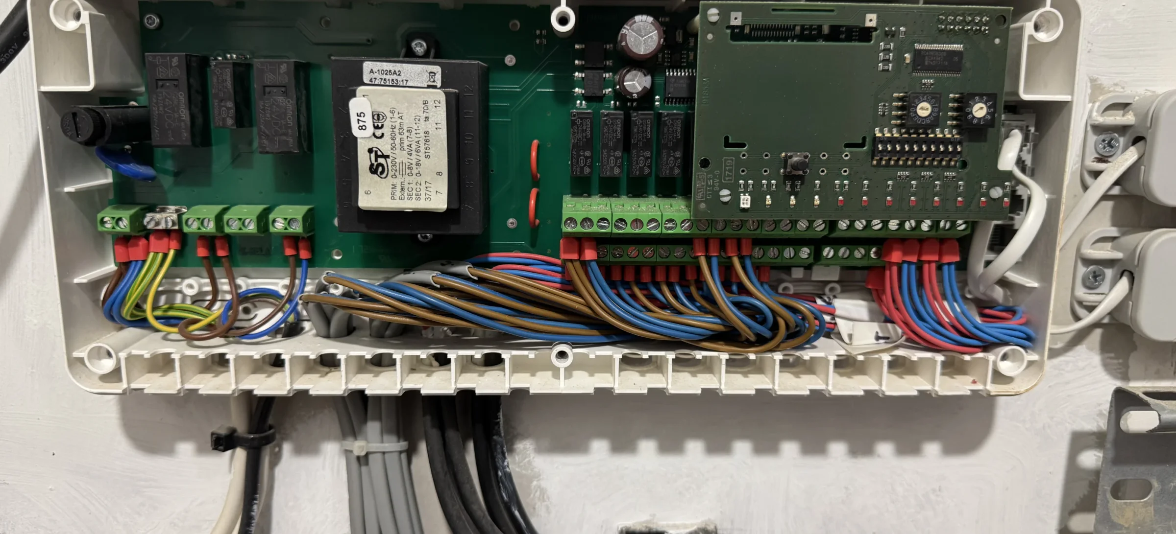 After: New 12-zone underfloor heating controller installed, neatly reterminated and tested.